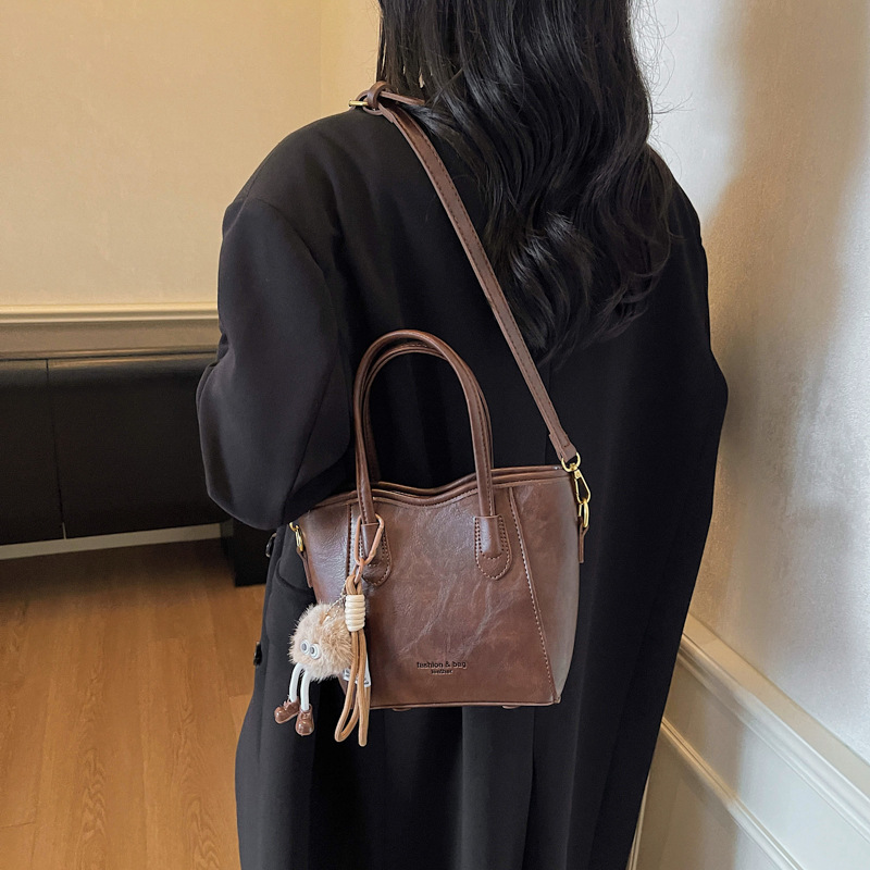 Bolso retro transfronterizo de alta calidad bolso de cubo de agua para mujeres otoño y invierno 2025 nuevo estilo versátil bolso de hombro bolso de moda