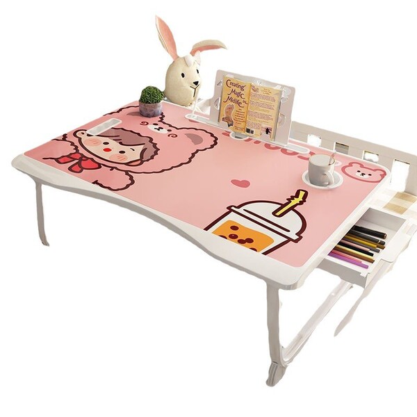 Folding the mobile lifting laptop computer table beside bed