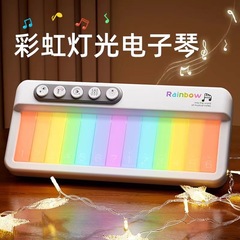 国境を越えた新しい虹の明かりの電子オルガンのタッチパネルの音楽の箱の益智は早く子供の楽器のピアノの音楽のおもちゃを教えます。