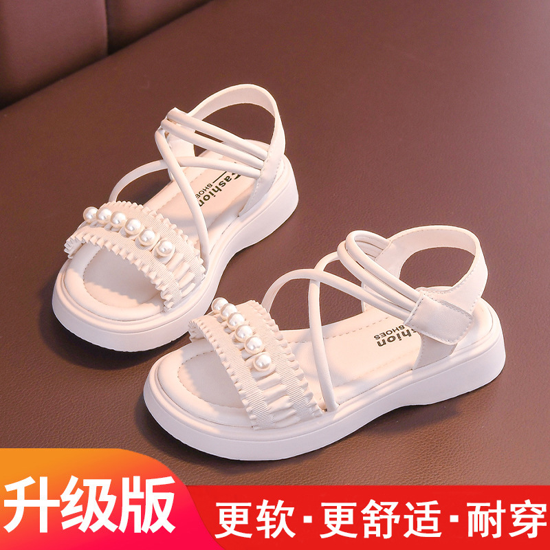 Sandalias para niñas 2025 verano nuevo estilo zapatos de princesa para niños zapatos de playa de suela suave antideslizante de suela suave zapatos para niñas de mediana edad