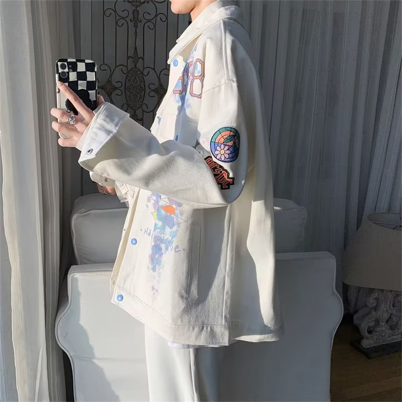 Colorido impreso solapa Denim chaqueta hombres primavera y otoño 2023 nueva suelta graffiti diseño sentido nicho estilo chaqueta