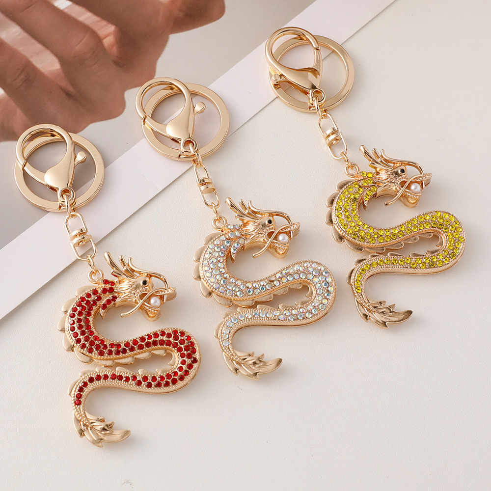 Estilo chino diamante incrustado suerte doce Zodiaco dragón estilo llavero animal año bolsa colgante metal dragón accesorios del coche