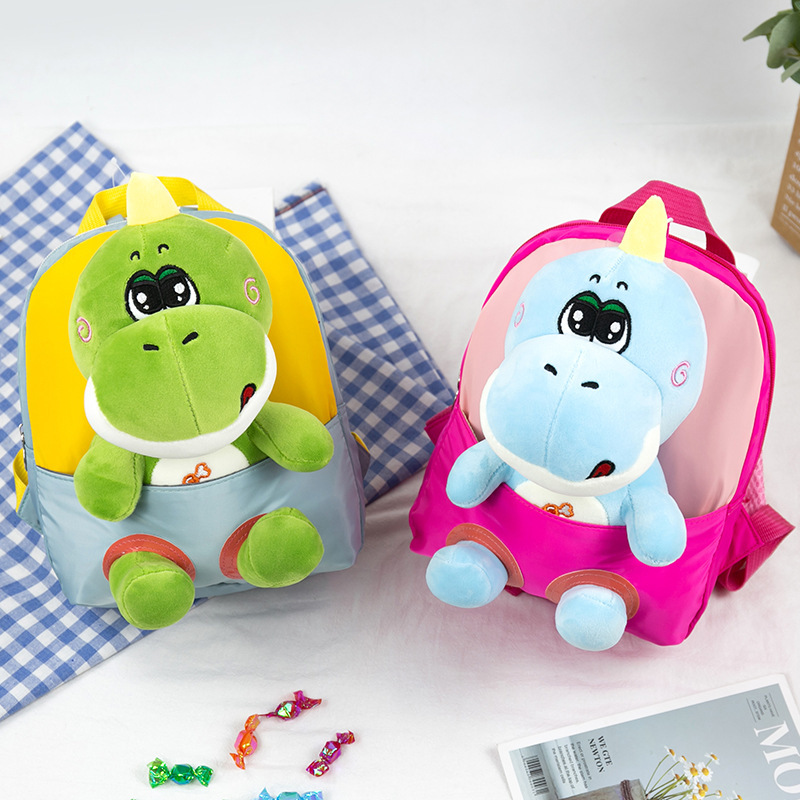 2023 nueva muñeca de dibujos animados desmontable kindergarten mochila de dibujos animados dinosaurio felpa niños bebé mochila