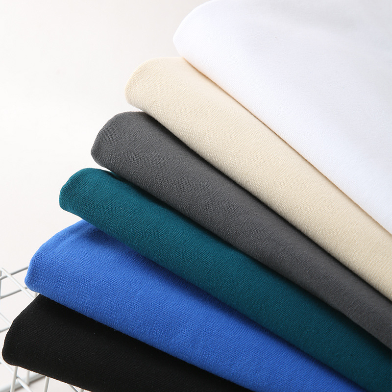 Primavera y otoño pesada camiseta de manga larga hombre Xinjiang algodón suelto suéter original de color sólido japonés 260G camiseta de base de moda