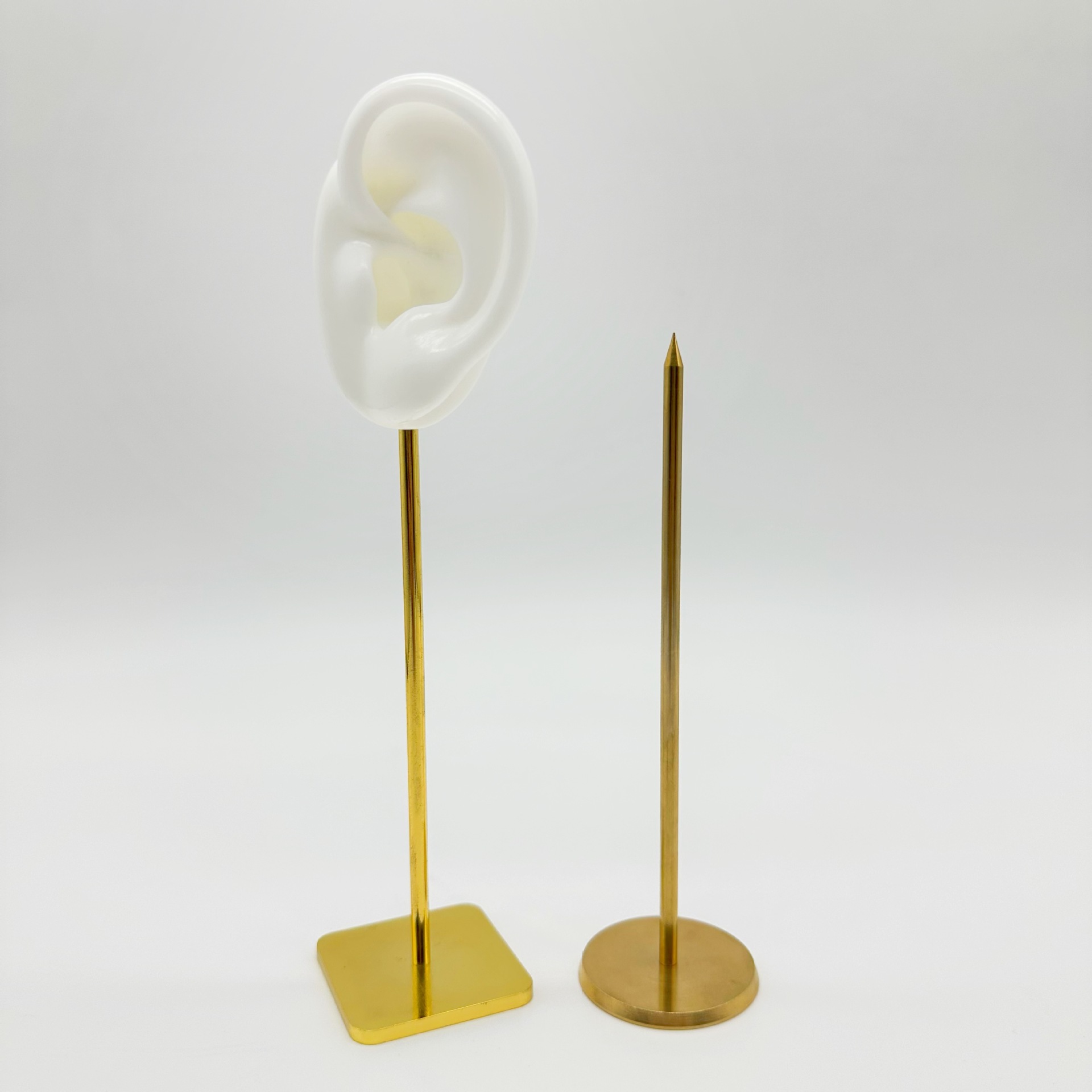 Simulación modelo de oído de silicona oído recogiendo auriculares de enseñanza soporte de exhibición de audífonos práctica modelo de acupuntura exhibición de la joyería