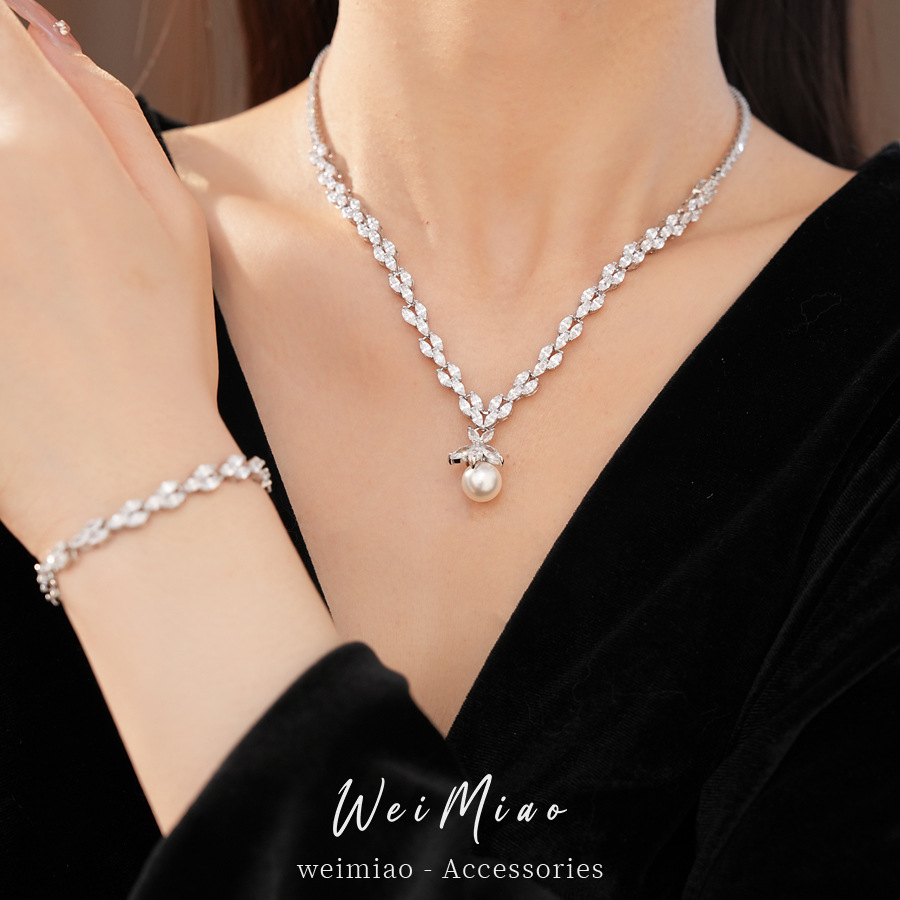Collar de perlas de zircón ligero de lujo nicho clavícula personalidad exquisita moda alta sensación conjunto de joyería al por mayor