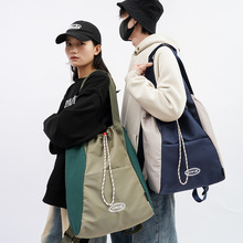 拼色双肩包女大容量时尚抽绳情侣大学生单肩斜挎包初中生手提背包