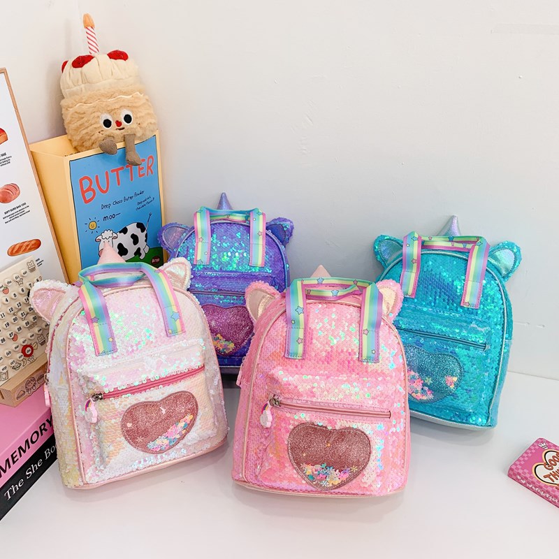 2025 nueva mochila infantil de moda esquinilla amor arena flotante mochila para niños y niñas mochila para niños jardín de infantes mochila pequeña