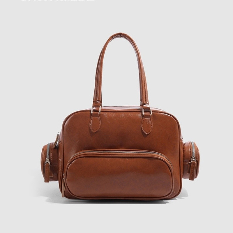 Boston 2024 new multi pocket niche leather motorcycle women's large capacity single shoulder armpit bag_voghion.com