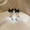 Silver needle, retro advanced black earrings with bow, silver 925 sample, high-quality style, wholesale