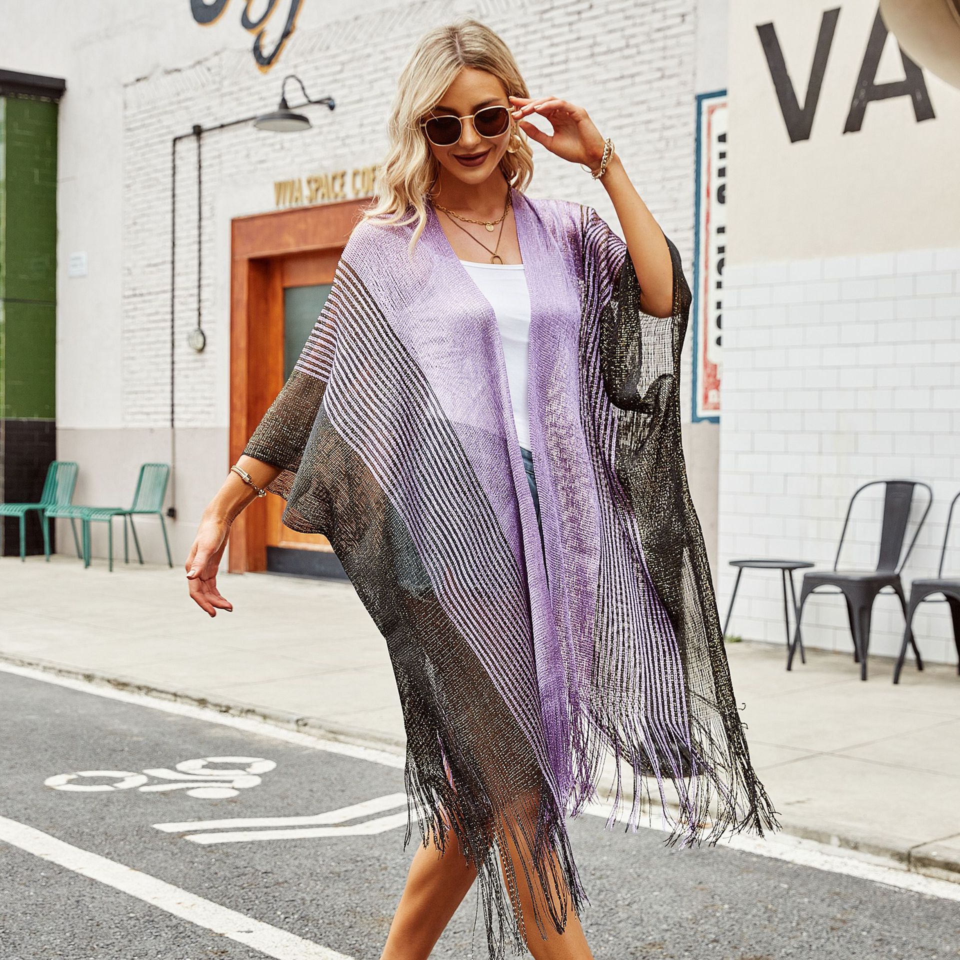 Verano nuevo hueco color matching punto borla chal vacaciones blusa borla hueco playa traje de baño blusa