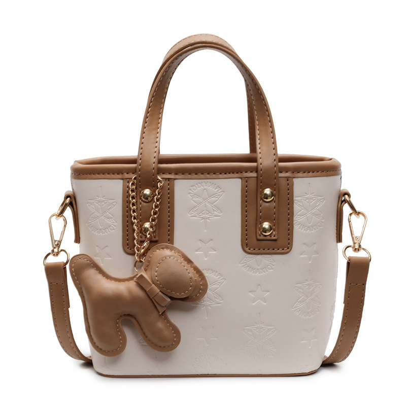 Este año, la popularidad de la bolsa de cubo de mano 2025, la nueva moda coreana, la bolsa de hombro super caliente, la sensación de alta calidad, la bolsa de mochila