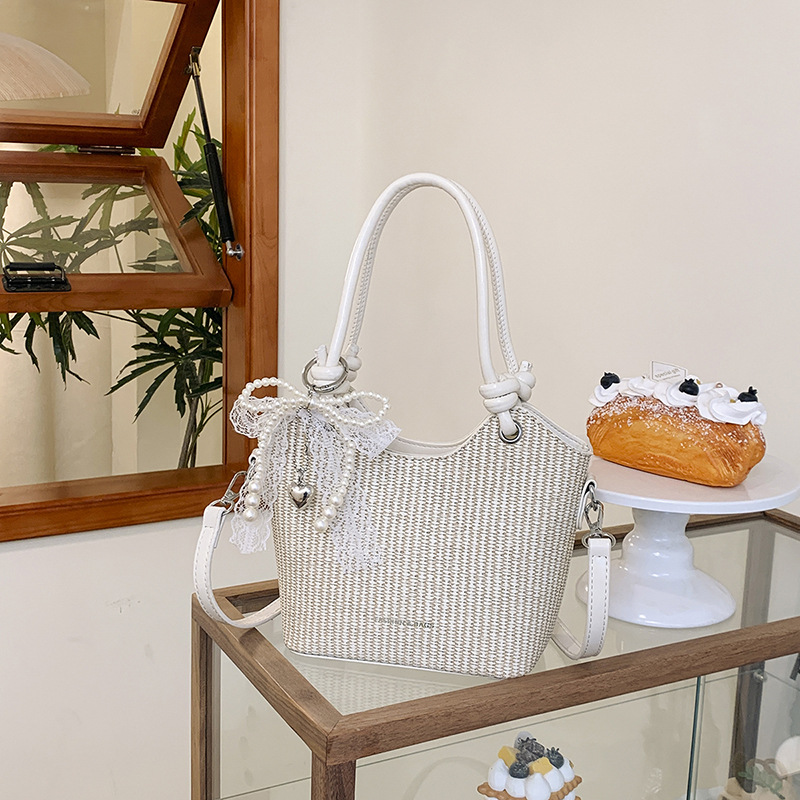 Bolsos de alta gama para mujer 2025 nuevo bolso de cubo popular moda bolso de hombro de todo fósforo bolso de mensajero de cercanías