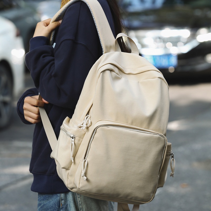 2024 invierno nueva mochila ligera de nailon de gran capacidad casual simple y versátil mochila para computadora para estudiantes de secundaria