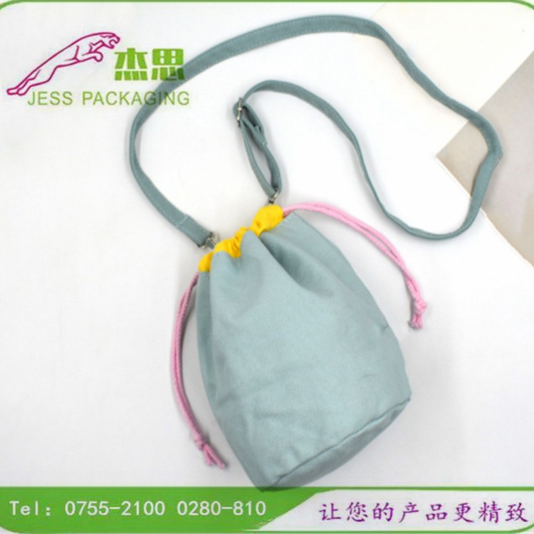 设计新款帆布清新蓝色手提束口包韩国斜挎单肩背包创意水桶收纳包