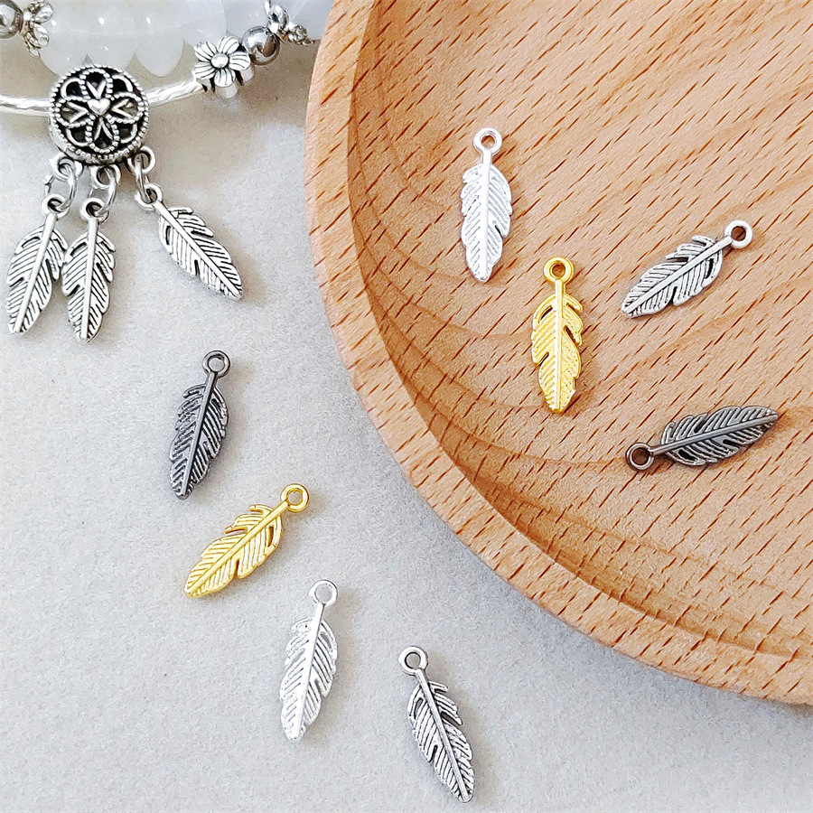 Alloy Xizang silver feather diy bracelet tassel accessories ancient silver pendant silver bracelet with beaded pendant beaded material