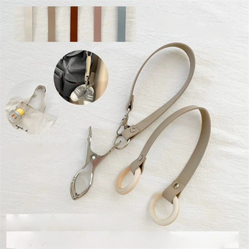 Зажим для обуви для детской коляски