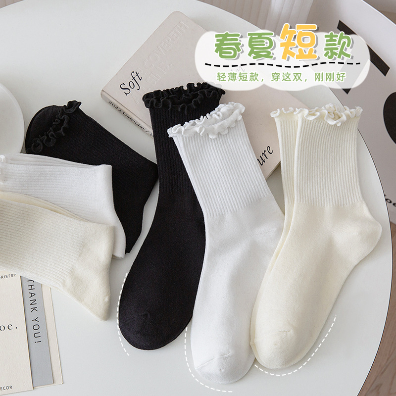 Calcetines de primavera y otoño calcetines de media pantorrilla calcetines de algodón de estudiante calcetines de piso de color sólido calcetines de mujer dulce calcetines de mujer calcetines de pila mujeres al por mayor