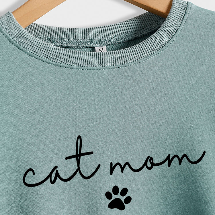 Amazon estación independiente transfronteriza gato mamá perro impreso cuello redondo letras sueltas moda mujer de manga larga suéter al por mayor
