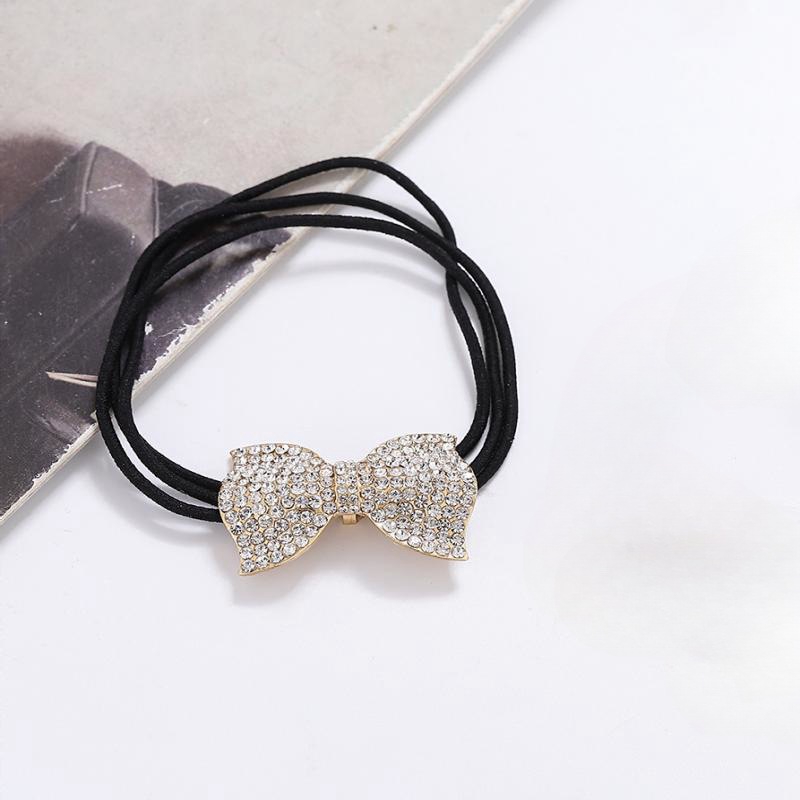 Corea del Sur Dongdaemun rhinestone geométrico curvo Super Flash banda de pelo accesorios para el cabello corbata de pelo femenina cuerda de pelo banda de goma femenina cuerda de pelo en forma de U