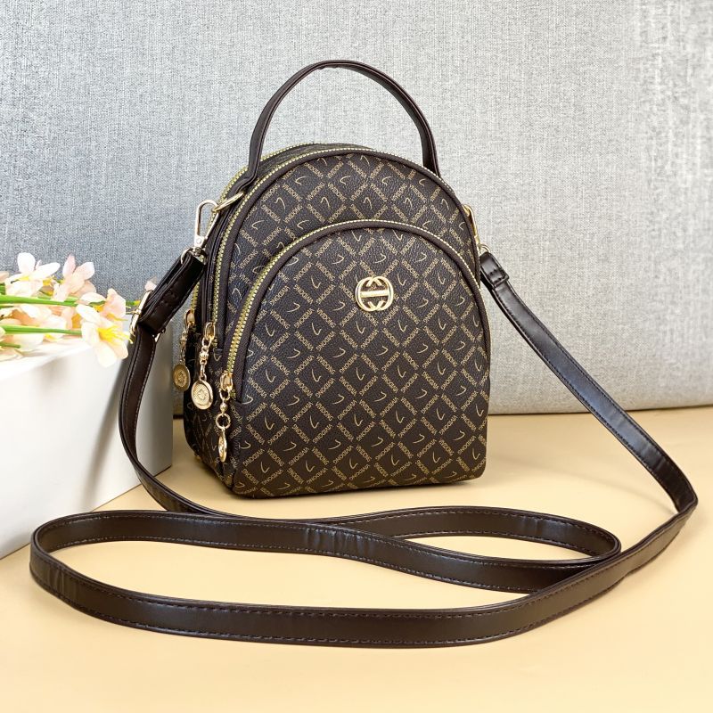 Guangzhou Hengli 2024 nueva moda mochila pequeña bolso de mano bolso de teléfono móvil madre de mediana edad bolso de mensajero de tres usar