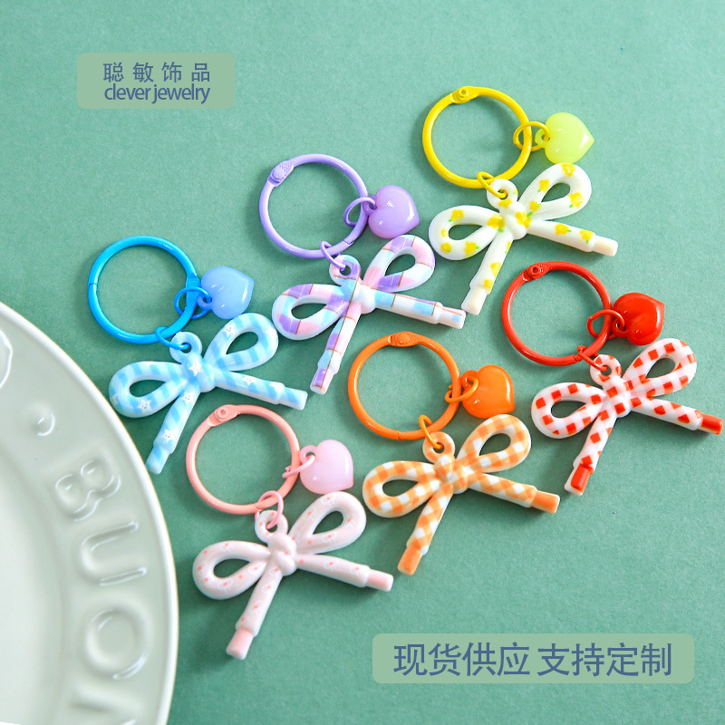 New Resin Pattern Bowknot Card Ring with Small Peach Heart Pendant Keychain, Simple and Versatile Bead Decoration Material New Resin Pattern Bowknot Card Ring with Small Peach Heart Pendant Keychain, Simple and Versatile Bead Decoration Material