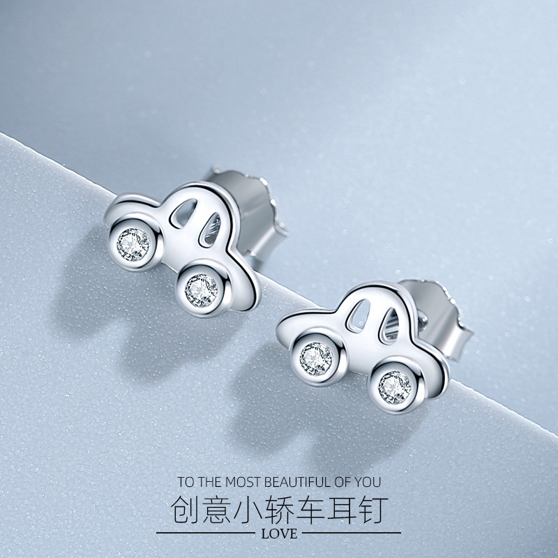 Aretes creativos de las mujeres de plata esterlina del coche S925 al por mayor coreano lindo mini coche pendientes ins estilo diversión