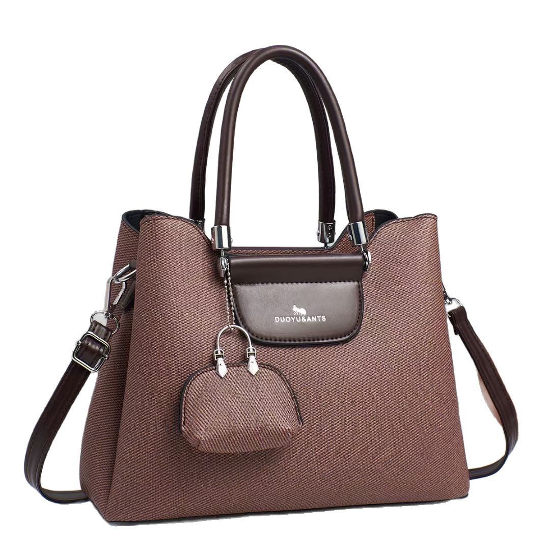 El nuevo bolso de mano para niños y madres está de moda en el bolso de hombro de textura, bolso de mensajero de diseño de nicho coreano de todo fósforo, comercio exterior