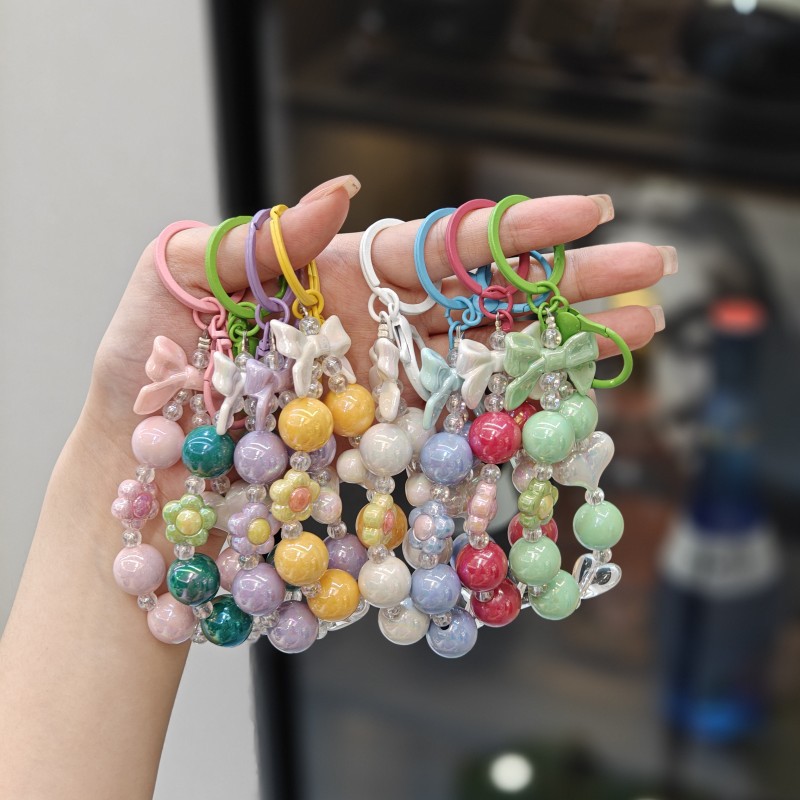 Creativo pequeño color caramelo fresco color chapado con cuentas llavero arco amor llavero bolsa pequeña colgante fuente