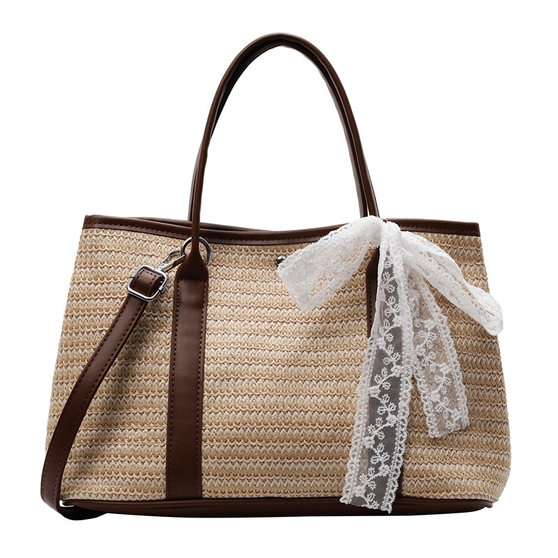 Paja tejida de color bolso de mano 2026 nuevo estilo transfronterizo vacaciones de estilo de alta calidad en la playa bolso de hombro