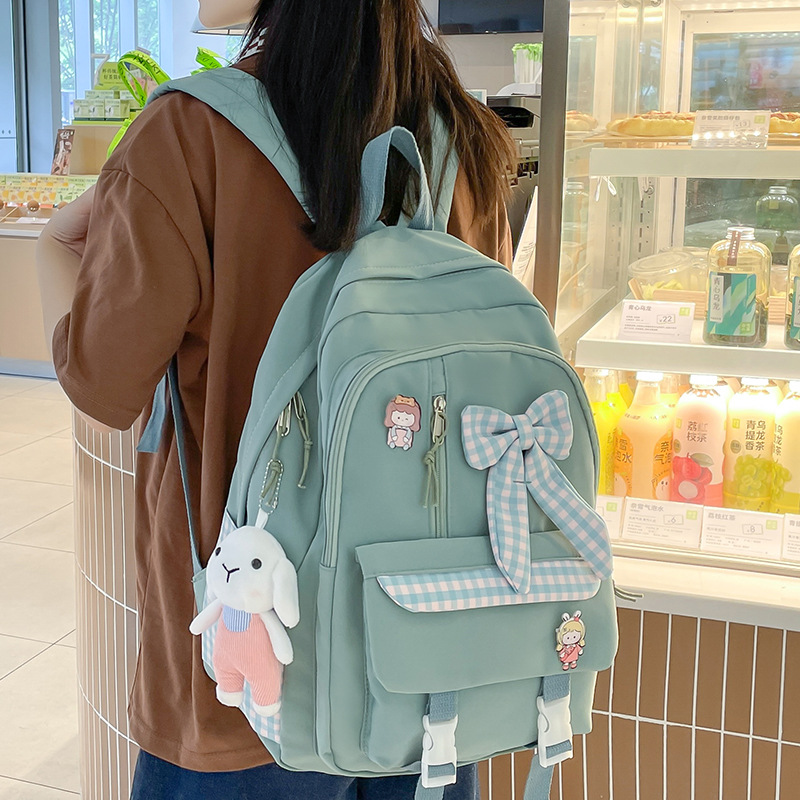 Mochila escolar para niñas de primaria y secundaria, diseño con lazo y estilo dulce, ligera y espaciosa
