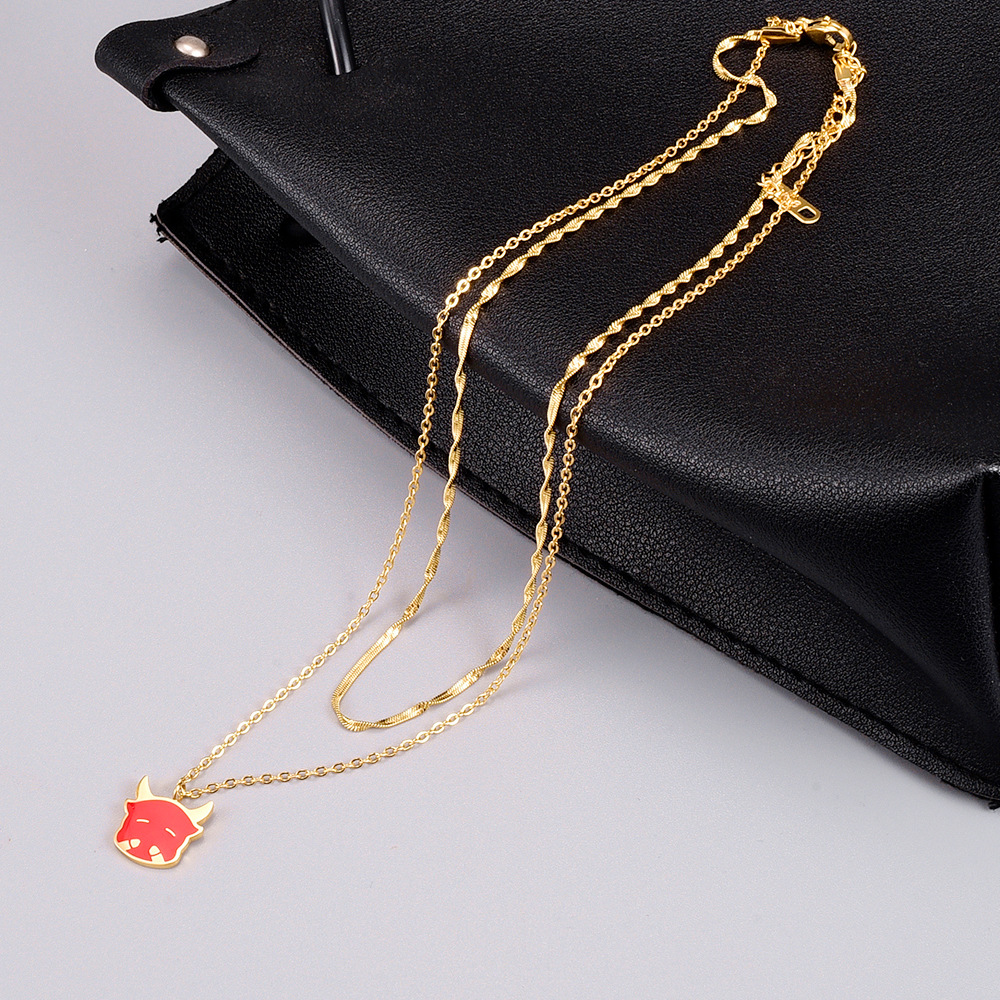 European And American Style Cute Calf Dripping Red Oil Titanium Steel Gold-plated Necklace display picture 3