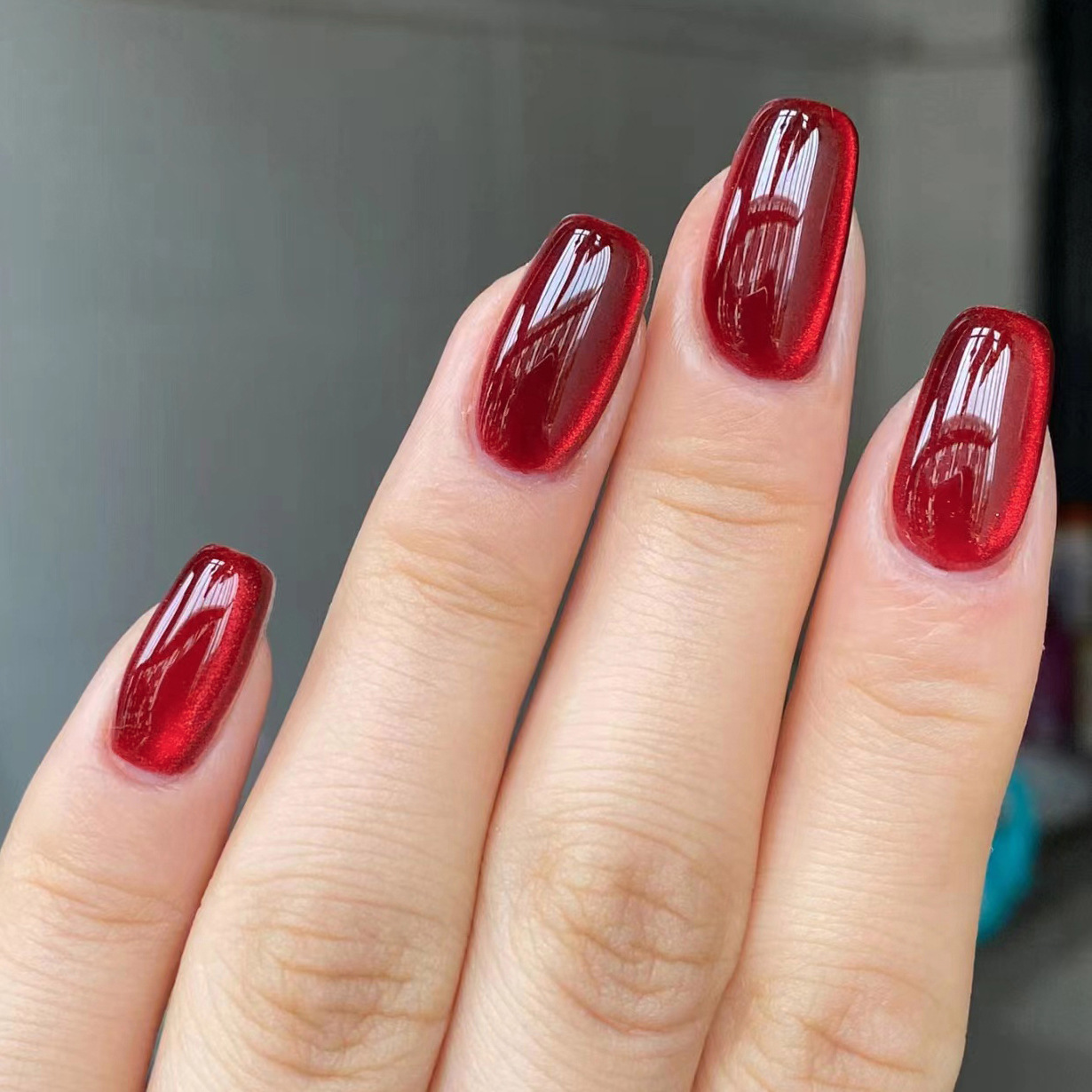 Año nuevo Ojo de gato rojo color sólido desgaste uñas corto Otoño e Invierno blanco simple manicura extraíble pieza fábrica al por mayor