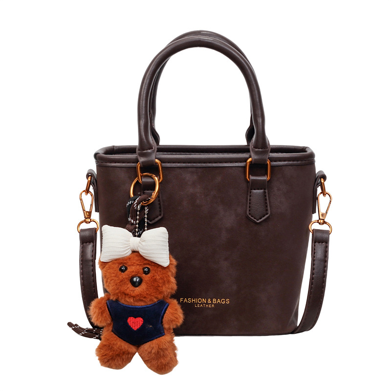 Bolso de mano esmerilado transfronterizo 2025, nuevo invierno popular bolso de cubo de moda de mujer bolso de hombro de estilo extranjero mochila