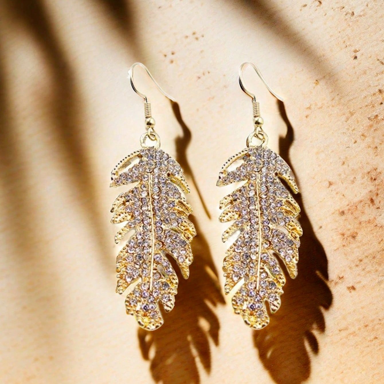 fashionable elegant earrings with rhinestones
