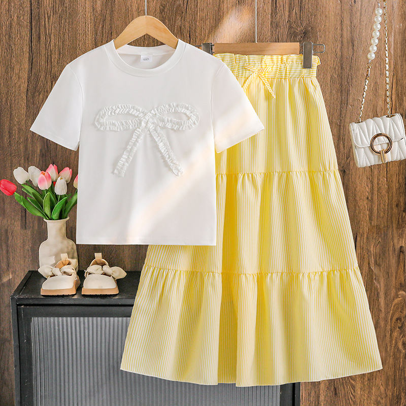 Niñas y niños grandes trajes transfronterizos dulces y frescos de color sólido mangas cortas casuales de cintura alta capa de falda de cintura grande dos piezas