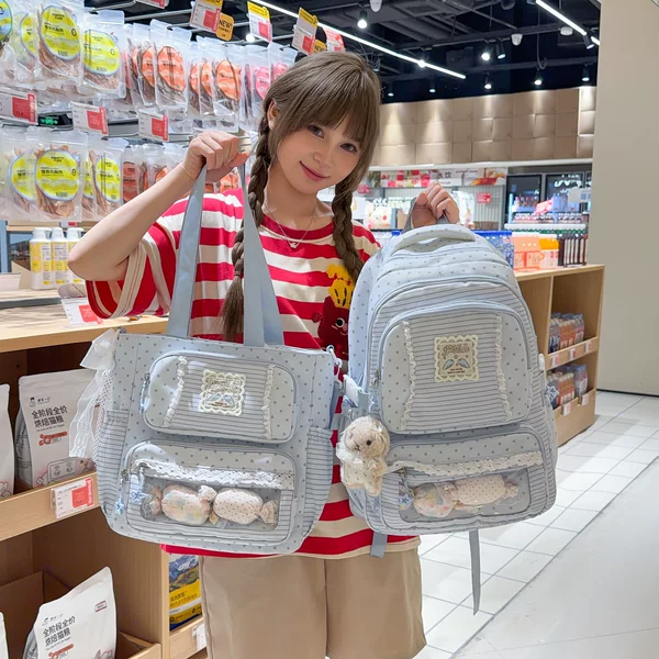 Cute polka-dot backpack for middle and high school girls, designed to reduce the weight of school bags, suitable for elementary school students in grades three to six, and also a trendy "pain bag" for girls