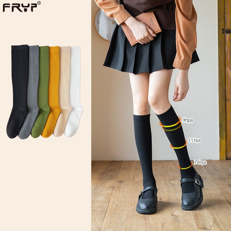 Calcetines de mujer primavera y verano micro presión calcetines flacos de la pierna cuatro estaciones uniformes JK medias hasta la rodilla al por mayor Otoño e Invierno ins marea