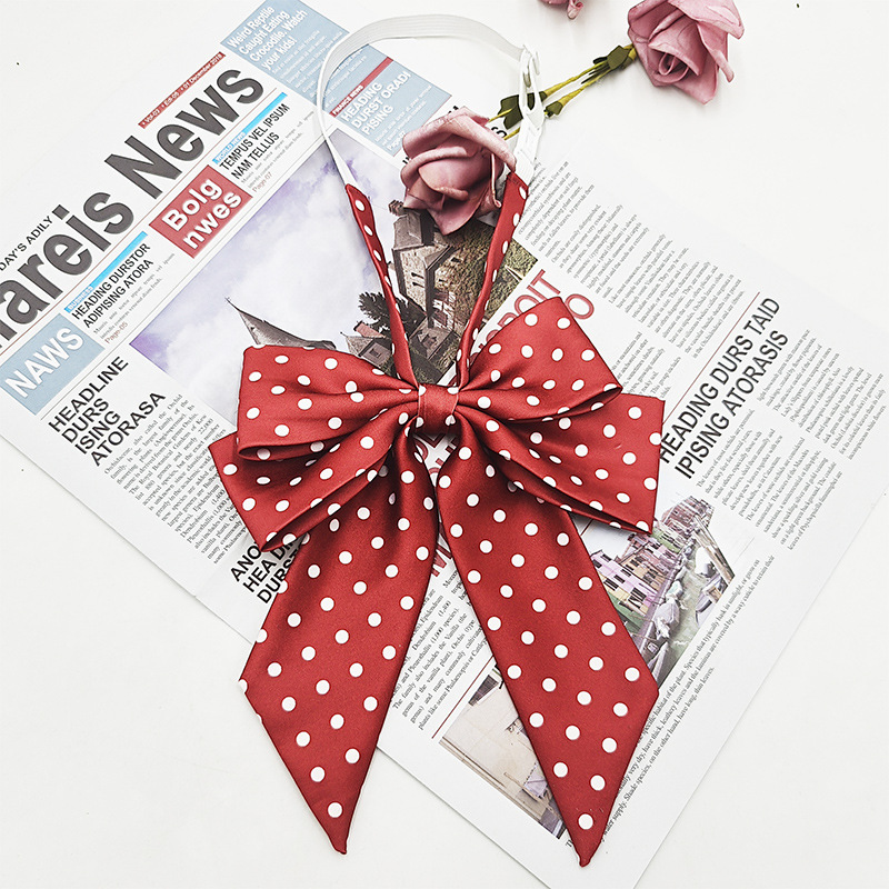 Punto al por mayor de doble capa oblicua pajarita de lunares moda nueva camisa estilo universitario uniforme enorme mango largo cuello JK flor