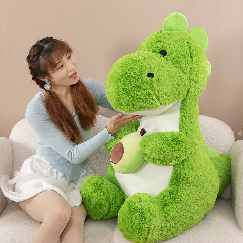 創意的な長毛牛油果恐竜のぬいぐるみが寝ています。|undefined