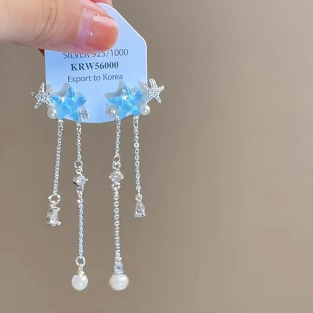 Summer blue fashionable elegant earrings with tassels