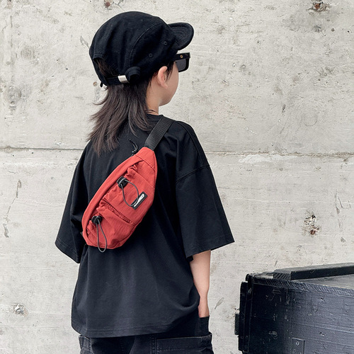 Children's Korean-style minimalist drawstring baby chest bag, stylish unisex children's casual crossbody bag, outdoor lightweight small waist bag