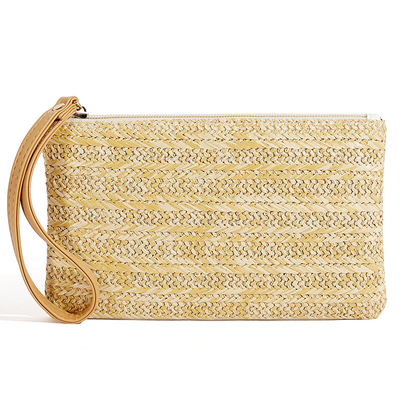 Bolsa de ombro em rattan trançado com acabamento em couro_voghion.com