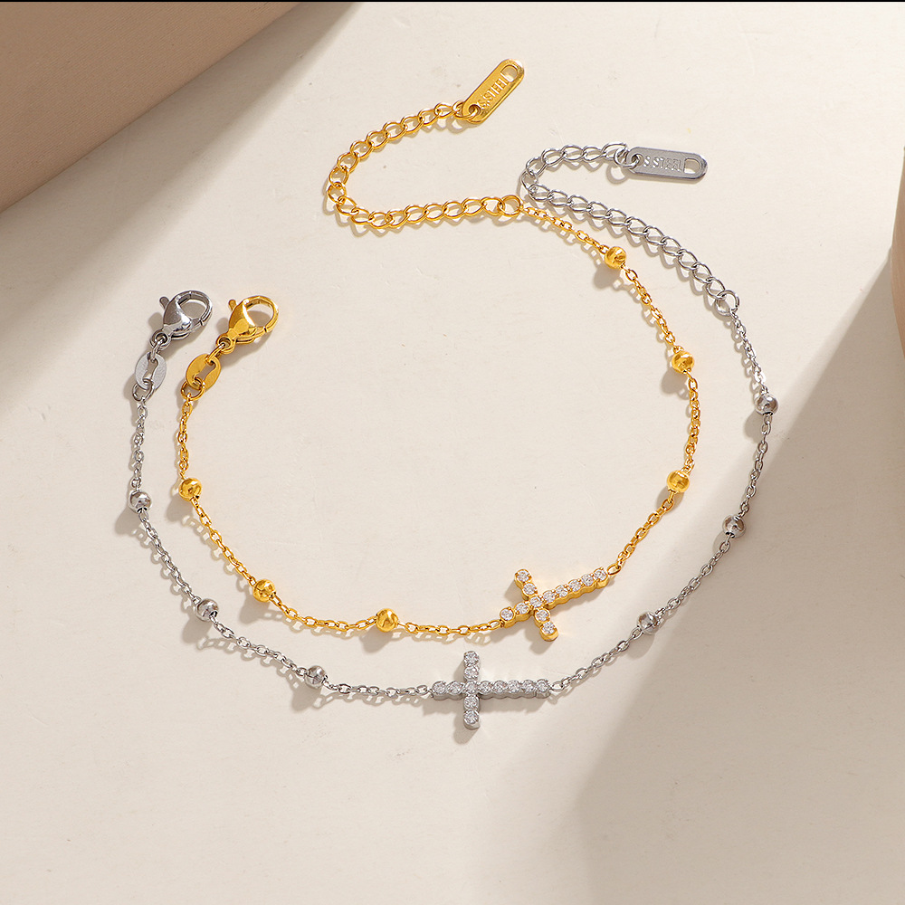 Titaniumstalen kruisarmband met zirkonia voor dames luxe_voghion.com