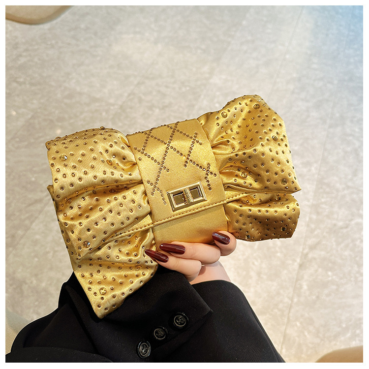 Paquete de cena de damas transfronterizas, paquete de fiesta de lujo ligero de diamante, paquete de cena de mano de arco de arco de oro de alto nivel