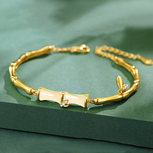 A light luxury and exquisite design sense jadeite bracelet for girls with bamboo joint patterns, featuring a unique and sophisticated design.