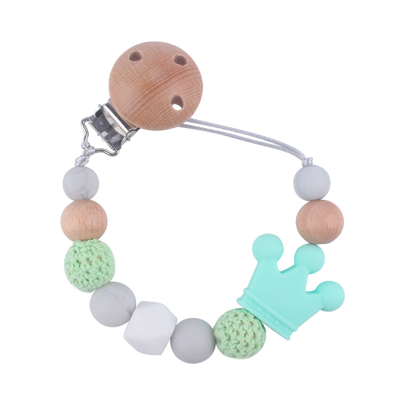 Suministros para bebés calmante clip de chupete de haya bebé anti-caída de la cadena de dibujos animados corona de silicona perlas mordedura molar chupete cadena