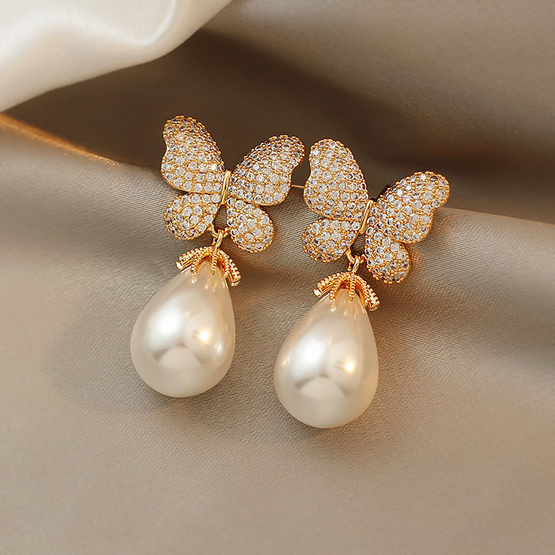 Nihaojewelry Fashion Pearl Diamond Butterfly Earrings Wholesale Jewelry display picture 2