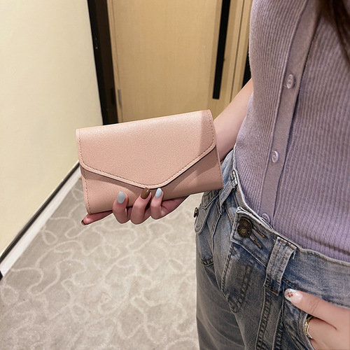 新款纯护照夹钱包女士长款拉链手拿包毛球简约零钱包一件发