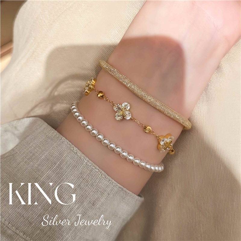 四叶知秋 | king银饰珠宝S925银镀金镭射四叶花CNS女时尚纯银手链|undefined